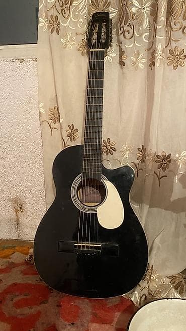 Аккордеоны: Классическая акустическая гитара, корпус формата с вырезом (cutaway) — 1