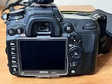 Фото жана видеокамералар: Зеркальная фотокамера Nikon D7000 с универсальным зум-объективом и — 2