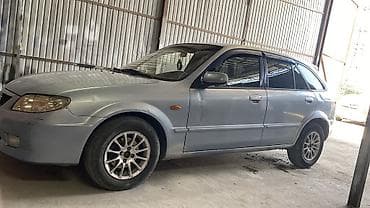 super cub: Mazda 323: 2002 г., 1.6 л, Механика, Бензин, Универсал — 4