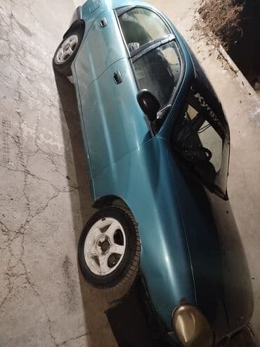 шинный центр с. ново николаевка фото: Daewoo Lanos: 1996 г., 1.5 л, Механика, Бензиновая, Седан — 1