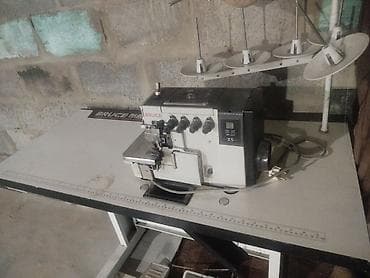 ротанг бу: Промышленный оверлок BRUCE X5 на столе с нитеводом на 4 катушки. - — 1