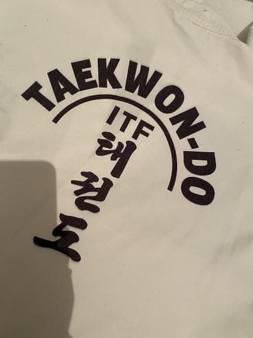 Спорт и отдых: Добок для тхэквондо ITF - Официальная вышивка ITF на груди: логотип — 5