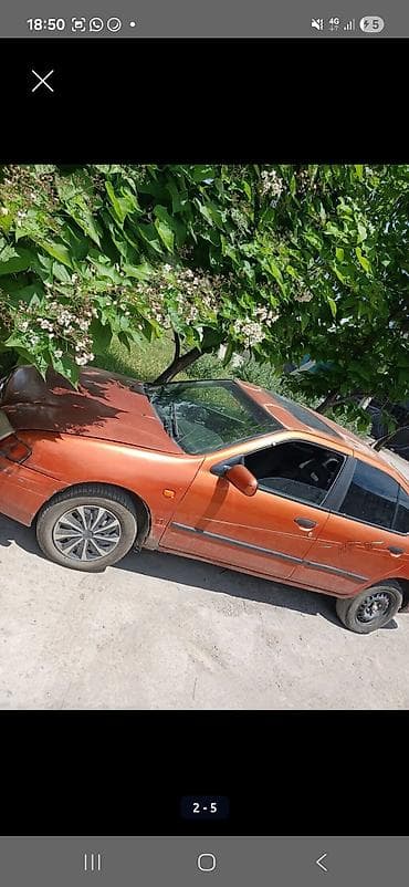 124 e500: Nissan Primera: 1997 г., Седан — 3