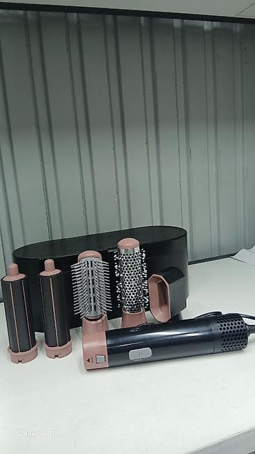 dyson styler: Многофункциональный стайлер для волос с насадками в футляре — 1