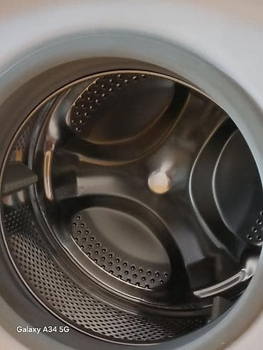 element 5: Стиральная машина Hotpoint-Ariston (фронтальная загрузка) - Загрузка — 4