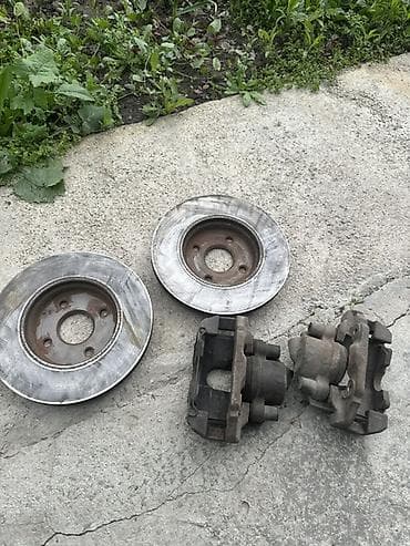 mini jack: На Мазда Демио 1’5. Комплект передних тормозных механизмов (2 — 2