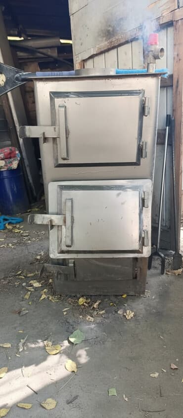 печ на отработке: Твердотопливный отопительный котёл (пиролизного/классического типа) — 2