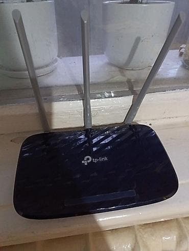 Wi‑Fi маршрутизатор TP‑Link с тремя внешними антеннами. Особенности
