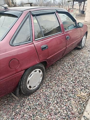 шагыл сокулук: Daewoo Nexia: 2012 г., 1.5 л, Кол менен иштөөчү, Газ, Седан — 4