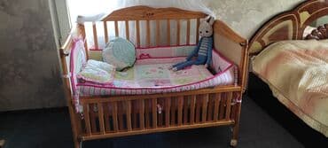 трёх ярусные кровати: Детская кроватка б/ у .Продам с бортиками и одеялом . также имеется — 1