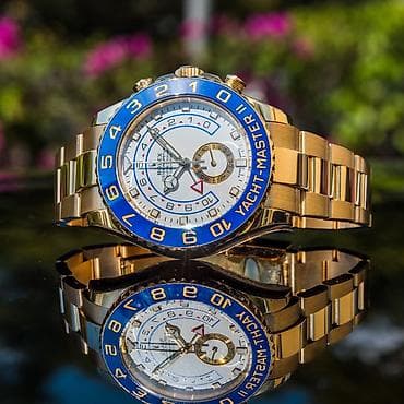 Кол сааттар: Rolex Yacht-master. • Корпус покрыт 18К желтым золотом. • Часы — 2