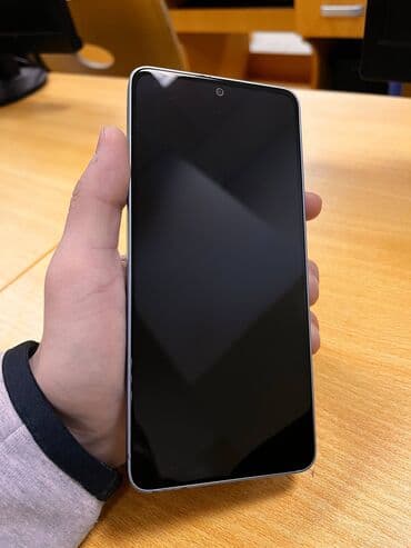 Паркет: Redmi, Redmi Note 13, Б/у, 256 ГБ, цвет - Голубой, 2 SIM — 1