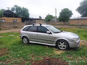 мазда фамиля: Mazda Familia: 1999 г., Механика, Универсал — 6