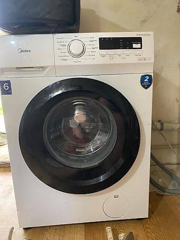 ремонт оверлока на дому: Стиральная машина Midea MFN60-S1003 Slim, фронтальная загрузка — 1