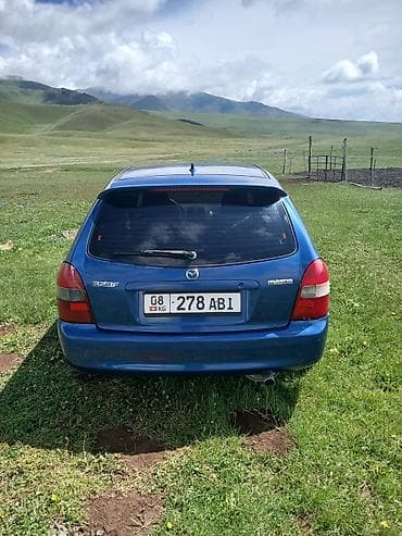 man 8: Mazda 323: 2003 г., 1.6 л, Механика, Бензин, Хэтчбэк — 5