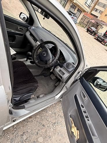 нексе: Mazda Demio: 2003 г., 1.3 л, Автомат, Бензин, Лифтбек — 8