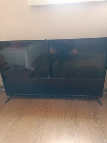 ТВ и видео: Телевизор Hisense, диагональ около 43–50". Особенности: - Тонкая — 2