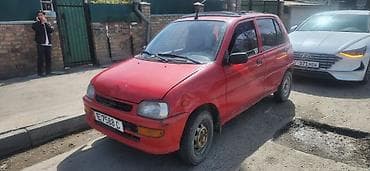 zimmer e9 pro: Daihatsu Cuore: 1995 г., 0.8 л, Ручные, Бензин, Хэтчбэк — 6