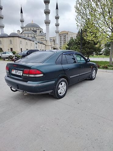 Унаа сатуу: Mazda 626: 1999 г., 2 л, Кол менен иштөөчү, Газ, Седан — 1