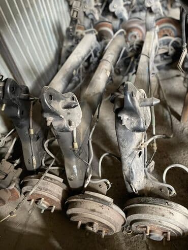 средний кузов двух скат: Mazda Demio 2 DY3W Задняя балка в сборе в наличии Мазда Демио Объем — 1