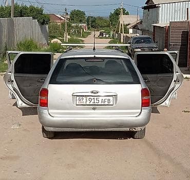 Транспорт: Ford Mondeo: 1999 г., 1.8 л, Механика, Бензин, Универсал — 9