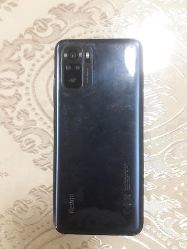 Смартфон Xiaomi Redmi Note 10, 4/64 ГБ. - Экран: AMOLED, отверстие