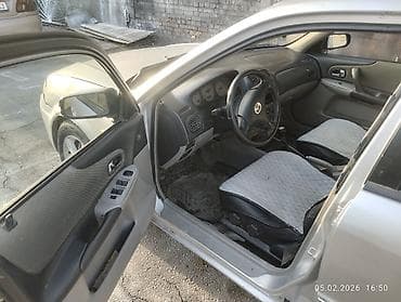 forester 2003: Mazda 323: 2003 г., 1.6 л, Механика, Бензин, Хэтчбэк — 8