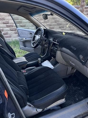 Mazda 626: 2000 г., 2 л, Механика, Седан