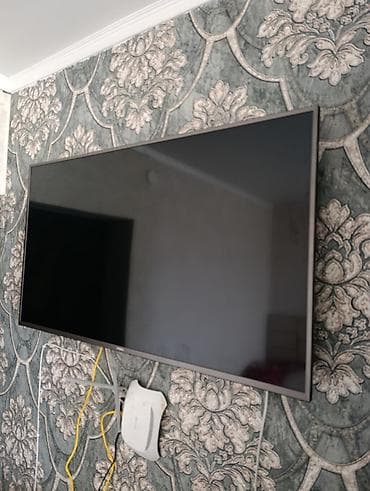 Телевизор VASIN, диагональ ориентировочно 43–50". Тонкие рамки