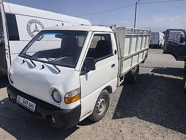 Транспорт: Компактный бортовой грузовик Hyundai Porter с однорядной кабиной — 1