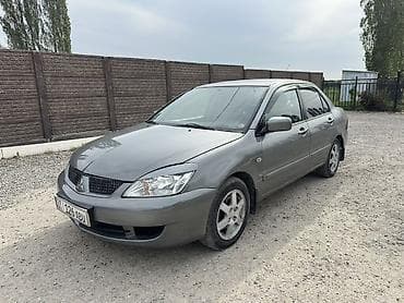 аудио усилитель: Mitsubishi Lancer: 2006 г., 1.6 л, Механика, Бензин, Седан — 4