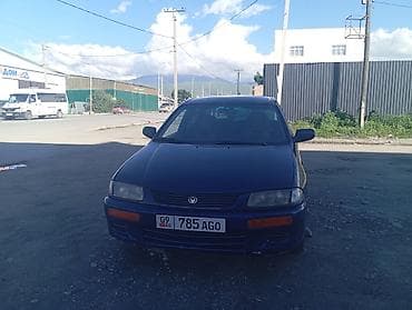 lx 470 2007: Mazda 323: 1996 г., 1.5 л, Механика, Бензин, Седан — 8