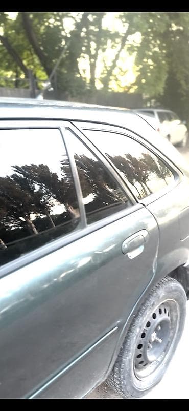 Mazda 323: 2002 г., Автомат, Бензин, Хэтчбэк
