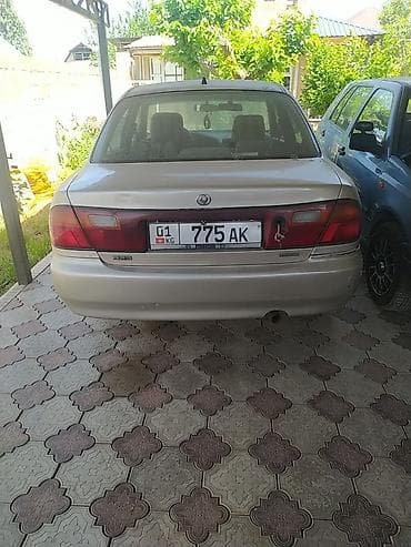 Mazda 323: 1996 г., 1.5 л, Автомат, Бензин, Седан