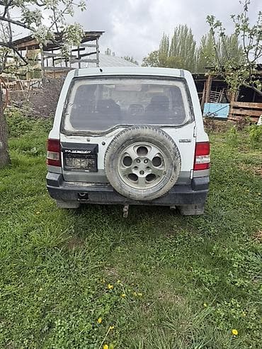 маз водовоз: Mitsubishi Pajero iO: 1998 г., Внедорожник — 2
