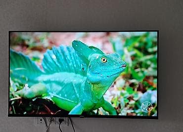 smart tv android 13: Смарт‑телевизор Yasin, диагональ около 43. Тонкие рамки, настенное — 1