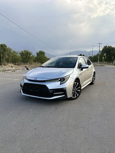 byd e2 2023: Toyota Corolla: 2021 г., 1.8 л, Автомат, Гибрид, Седан — 1