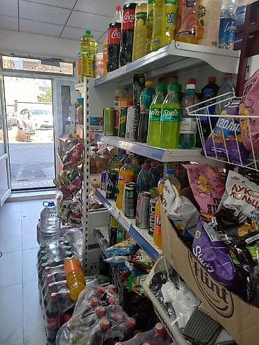 Мини-маркет продуктов повседневного спроса Ассортимент: - Напитки