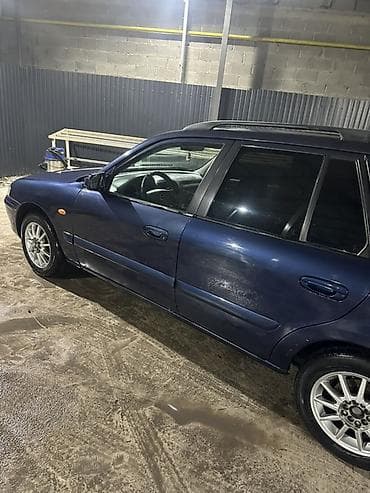 дмрв е34: Mazda Capella: 1999 г., Универсал — 3