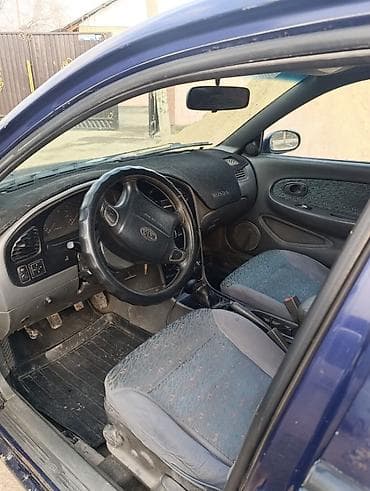 шагыл сокулук: Kia Shuma: 1999 г., 1.5 л, Кол менен иштөөчү, Газ, Седан — 4