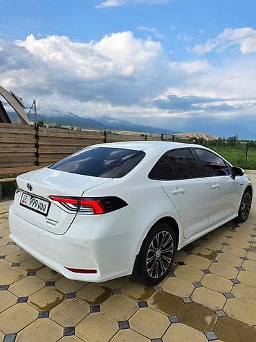 byd yuan up leading: Toyota Corolla: 2022 г., 1.8 л, Автомат, Гибрид, Седан — 5