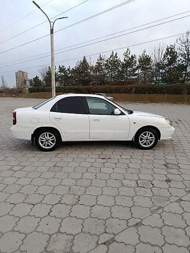 devo lasetti: Daewoo Nubira: 2001 г., Бензин — 3