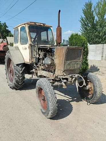 Тракторы John Deere: Трактор с навесным оборудованием Комплектация: - Колёсный трактор с — 1