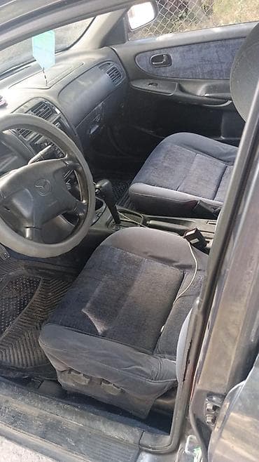 mg rx9: Mazda 626: 1999 г., 2 л, Автомат, Седан — 5
