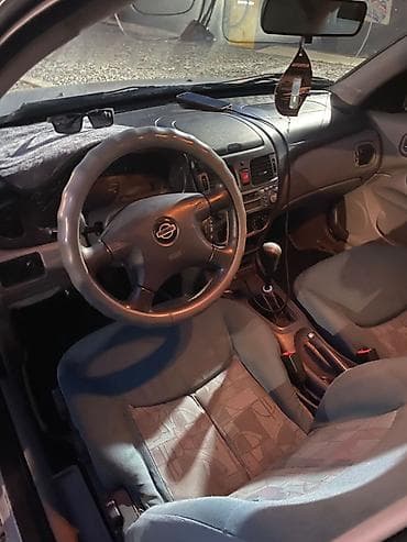 авто г каракол: Nissan Almera: 2002 г., 1.8 л, Кол менен иштөөчү, Бензин, Хетчбек — 7