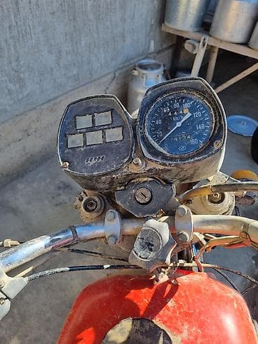 Мотоцикл ИЖ (семейство «Планета/Юпитер») с документом: на фото —