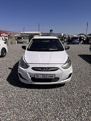 Унаа: Hyundai Solaris: 2013 г., 1.4 л, Кол менен иштөөчү, Бензин, Седан — 1