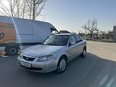 handa jazz: Mazda 323: 2002 г., 1.6 л, Механика, Бензин, Седан — 2