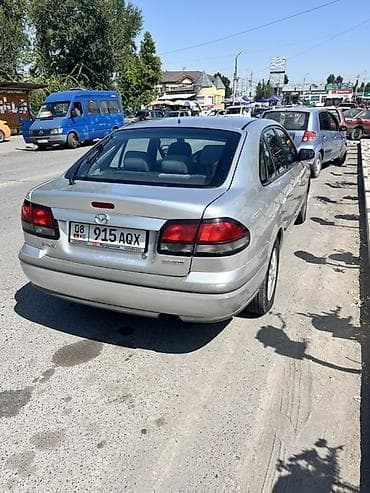 капела 626: Mazda 626: 1999 г., 1.8 л, Бензин, Седан — 2
