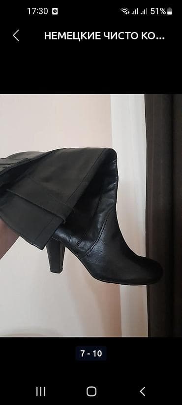 Женские кожаные сапоги высотой до колена на устойчивом каблуке. Модель